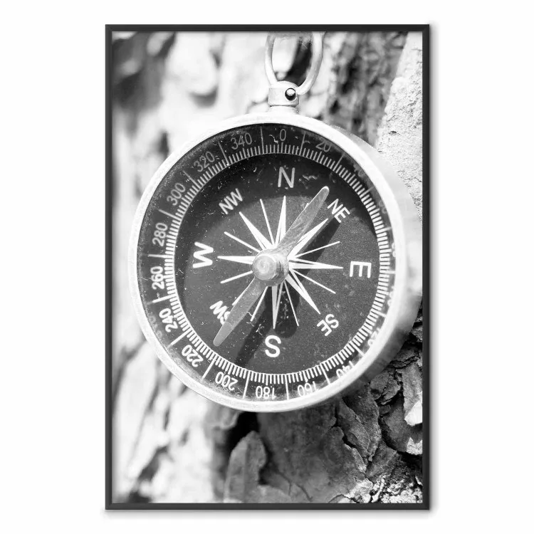 Black and white compass - rocks and a compass pointing the right direction