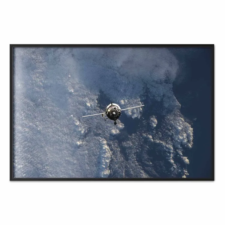 Blue Planet - space satellite above Earth against the backdrop of sky and clouds