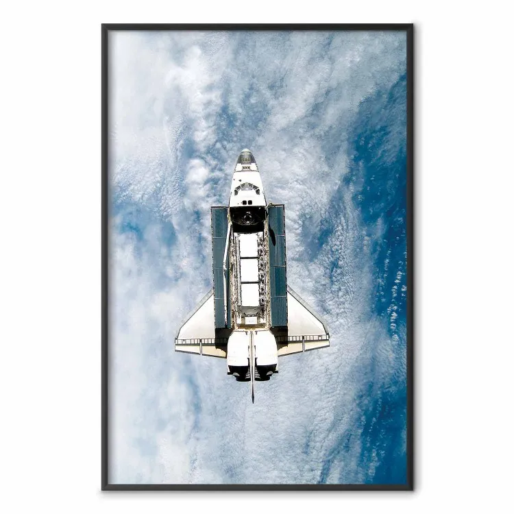 Space Shuttle - white space shuttle against a backdrop of clouds and oceans