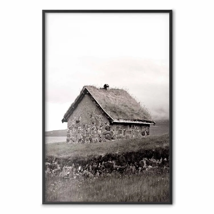 Fisherman's Hut - landscape of a field and a stone house against a clear sky