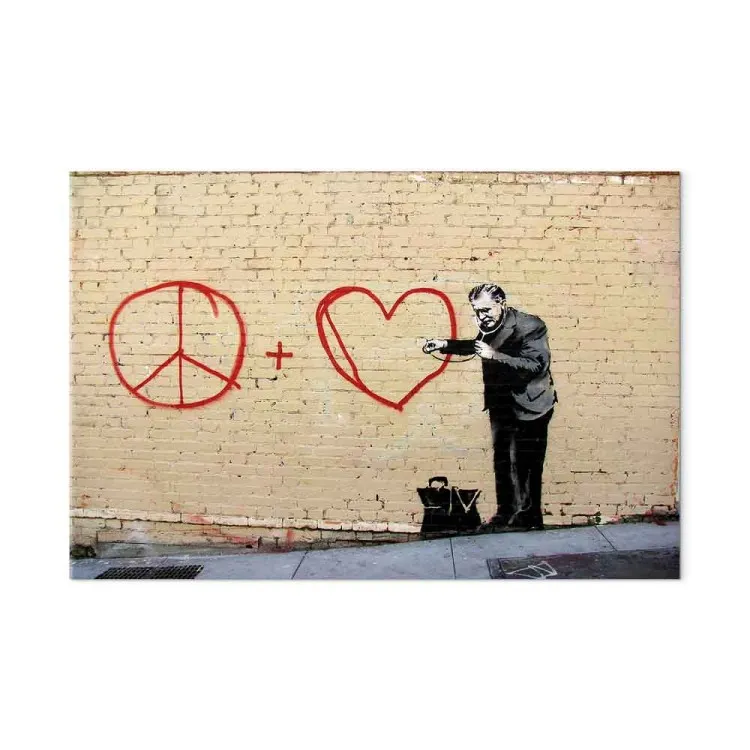 Peaceful Doctor (Banksy) - street art of a man on a brick wall