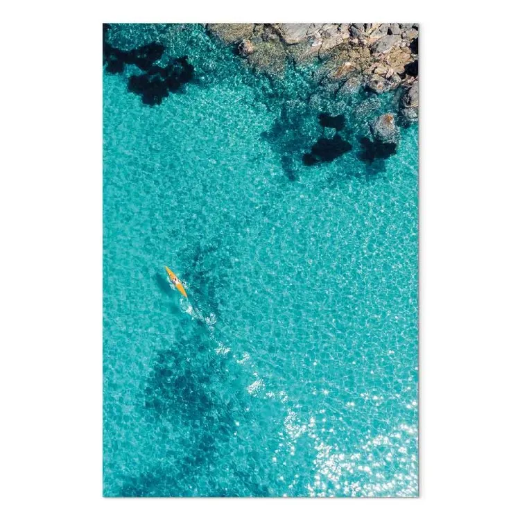 Azure water - sea landscape with transparent water and a yellow canoe