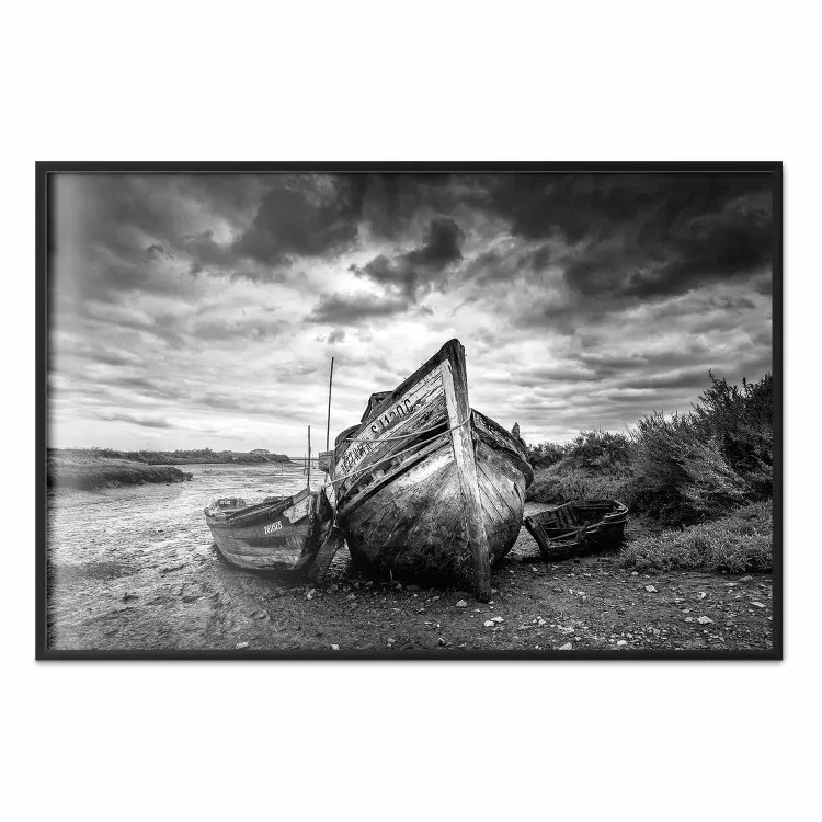 Journey into Nature - black and white abandoned boat against sky and clouds